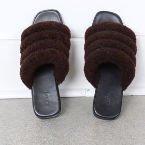 EDUN shearling slides